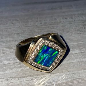 14k gold ring with blue opal and 1 Karat of diamonds